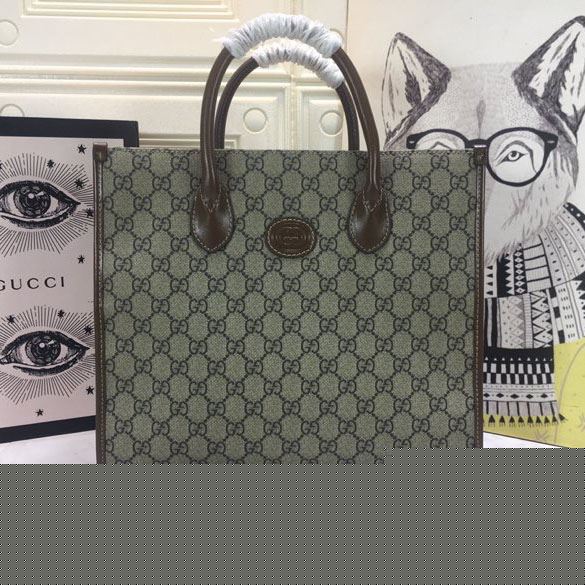 G*u*i shopping bags